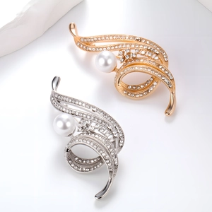 Luxury spiral leaf brooch set with sparkling crystals and large white pearls