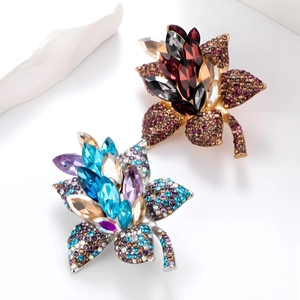 Vintage floral crystal brooches in gold and silver finish with colorful rhinestones