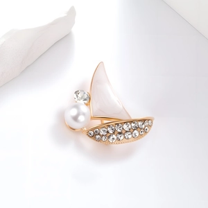 Elegant sailboat brooch in gold alloy with white enamel, pearls and sparkling rhinestones