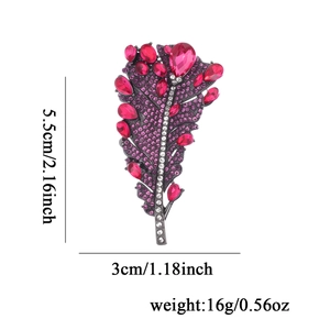 Eleganter Vintage-Feder-Brosche mit rosa Edelsteinen und weißen Zirkonia in Silber