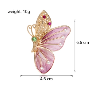 Broche papillon vintage avec strass roses, émail violet et perles 6,6x4,6cm