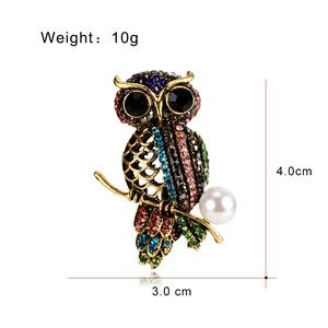 Elegante broche de búho con diamantes de imitación coloridos y perla en oro vintage