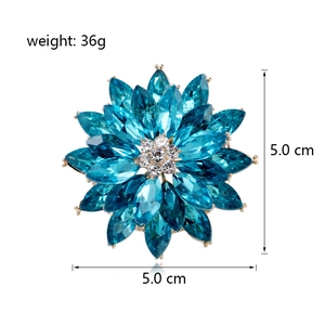 Luxurious blue crystal snowflake brooch with marquise stones and sparkling rhinestones