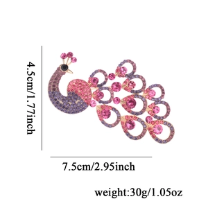 Crystal peacock brooch in gold alloy with purple rhinestones and size measurements