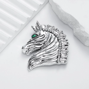 Retro silver zebra head brooch with green gemstone eyes and white sparkling rhinestones