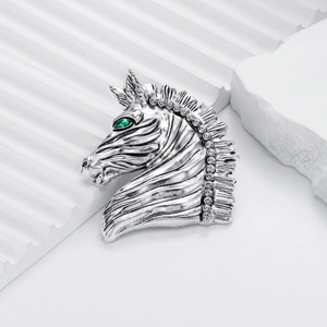 Retro silver zebra horse brooch with green gem eyes and white crystal mane accents