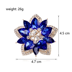 Floral crystal brooch with blue teardrop rhinestones and gold plating, 4.7cm x 4.5cm