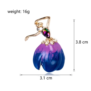 Elegant gold-tone ballerina brooch with blue-purple enamel skirt and crystal accents