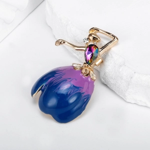 Elegant ballet dancer brooch with pear-cut crystal and blue enamel on a stone base