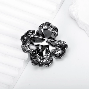 Luxurious black peony flower brooch with intricate crystals and secure pin clasp closure
