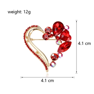 Golden heart brooch with deep red rhinestones and crystal accents, 4.1cm x 4.1cm size