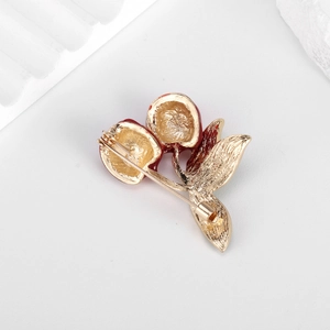 Back view of high-quality red cherry brooch with gold-plated alloy and enamel finish