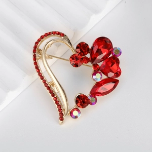 Elegant heart-shaped rhinestone brooch pin with red crystals and gold-tone finish