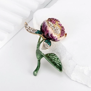 Elegante spilla a tulipano dorata con smalto viola e strass luccicanti per donna