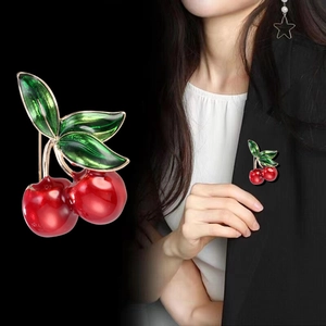 Fashionable red cherry brooch pin with green leaves and gold plating for women