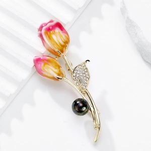 Elegant tulip brooch with pink enamel petals, zircon leaves and a pearl on white stone