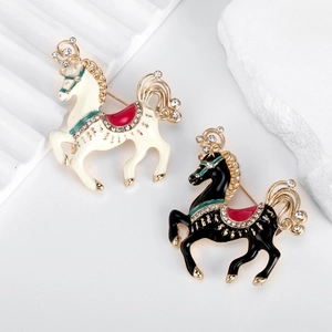 Exquisite horse brooches with sparkling crystals and enamel in black and ivory colors