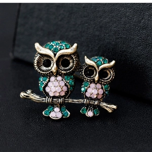 Vintage gold owl brooch with green and pink rhinestones on branch for women