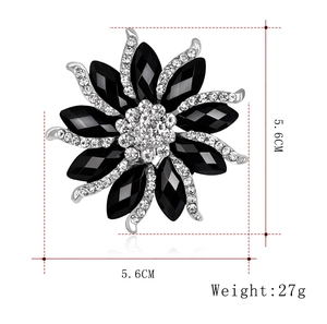 Elegant rhinestone flower brooch with black gemstones and silver accents, 5.6cm size
