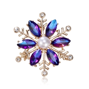 Detailed snowflake brooch with purple crystal petals and a central white pearl