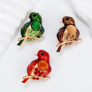 Broches oiseaux en alliage avec émail coloré, pierres œil-de-chat et strass scintillants