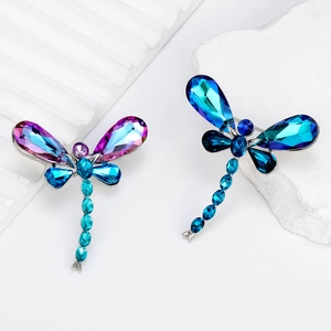 Elegant crystal dragonfly brooches in purple and blue tones for suit accessories