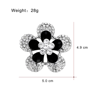 Silver alloy flower brooch with black gemstones and crystals, size 5.0cm by 4.9cm