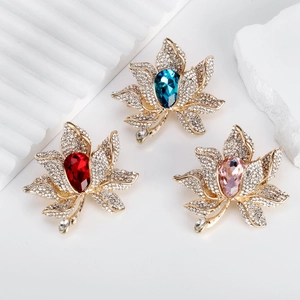 Exquisite maple leaf brooches with sparkling crystals and vibrant center gemstones