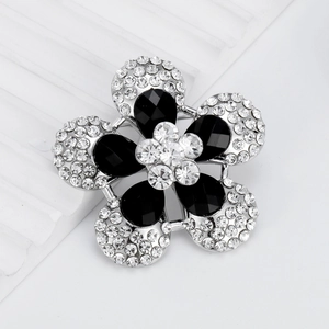 Elegant floral alloy brooch featuring black teardrop stones and sparkling clear rhinestones