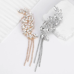 Irregular crystal fringe leaf brooch in gold and silver plating with rhinestone tassels