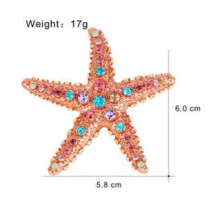 Elegant rose gold starfish brooch with colorful rhinestones and lifelike textures