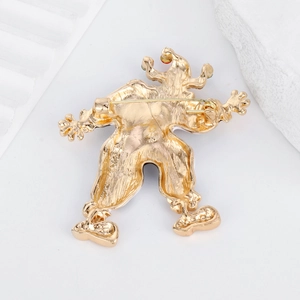 Back view of vintage clown brooch with secure metal pin safety clasp in gold finish