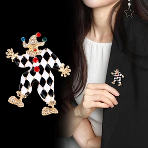 Vintage clown brooch with colorful rhinestones and black white checkered enamel
