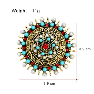 Bohemian vintage round brooch with pearls and turquoise beads measuring 3.9 cm in diameter