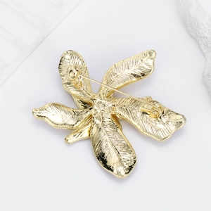 Double-layer purple enamel flower brooch with gold plated metal finish and secure pin back