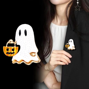 Ghost with pumpkin Halloween brooch in white enamel finish with gold metal details