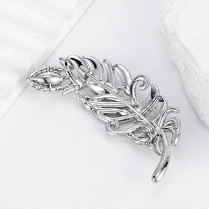 Elegant silver feather brooch pin accessory for luxury suits with detailed alloy texture
