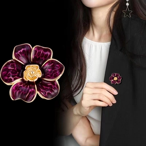 Retro purple camellia flower brooch with gold accents on black blazer for women