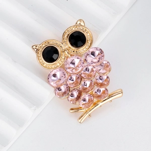 Exquisite golden owl brooch with pink crystals and black gemstone eyes for women