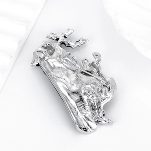 Silver vintage magician brooch with textured metal finish and secure pin clasp back