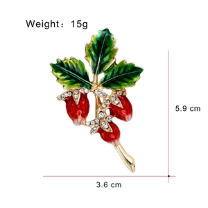 Elegant strawberry brooch with red enamel fruits and sparkling rhinestones on gold base