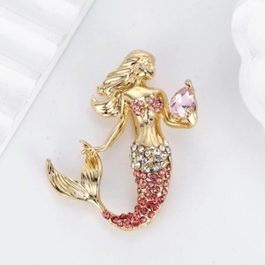 Golden mermaid brooch with pink pear-shaped crystal and sparkling rhinestones