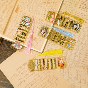 Detailed view of four acrylic bookmarks with colorful tassels and literary illustrations