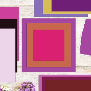 Flat lay of purple collage scrapbooking paper with torn edges and floral accents