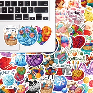 Detailed close-up of waterproof crochet knitting stickers on a white laptop lid