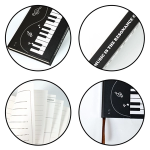 Detail of piano theme notebook showing staff notes, lined inner pages, and silk bookmark
