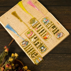 Set of four transparent acrylic bookmarks with floral designs and colorful silk tassels