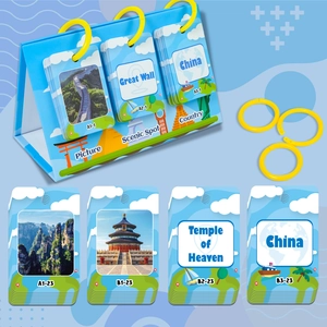Close-up of educational geography cards featuring world landmarks and yellow binder rings