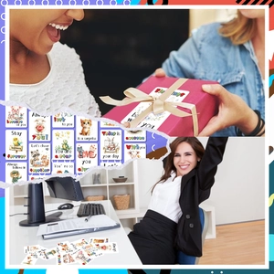 Close-up of cute cartoon animal greeting cards with motivational English text on a desk