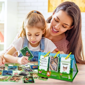 Parent-child interaction using animal flashcards with green desktop flip chart stand